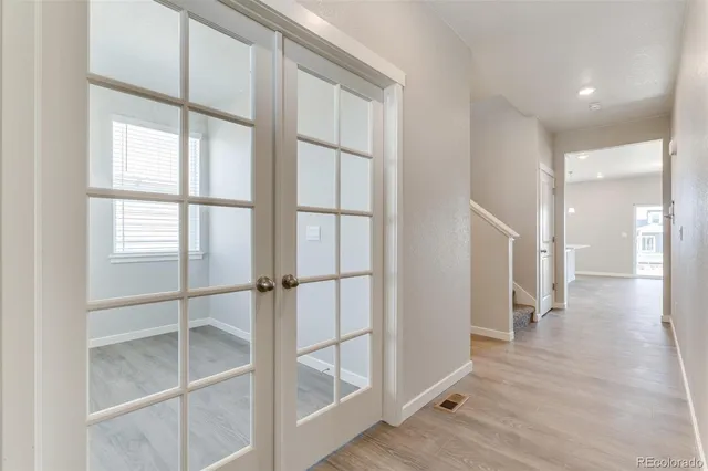 a view of entryway with wooden floor