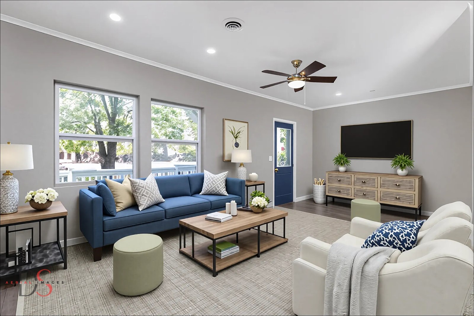 401 Scott Street Marseilles, IL 61341 - Photo 11 of 28 a living room with furniture a flat screen tv and a large window