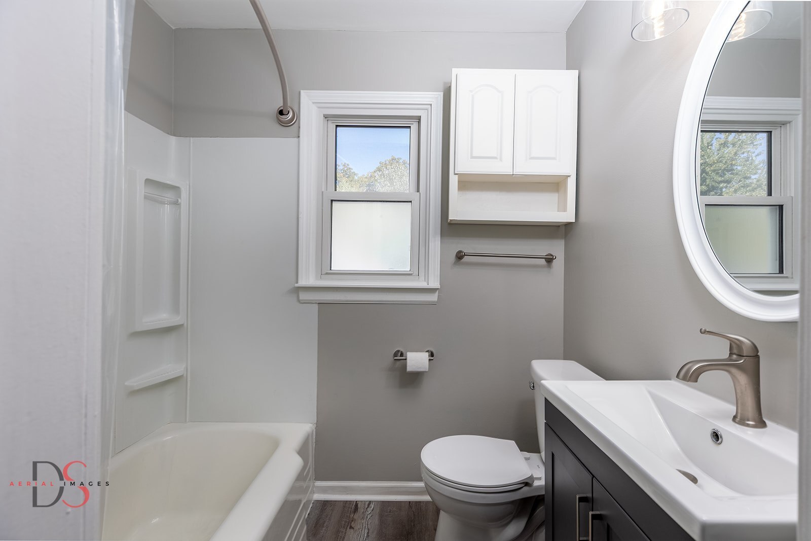 401 Scott Street Marseilles, IL 61341 - Photo 16 of 28 a bathroom with a sink a toilet and a bathtub