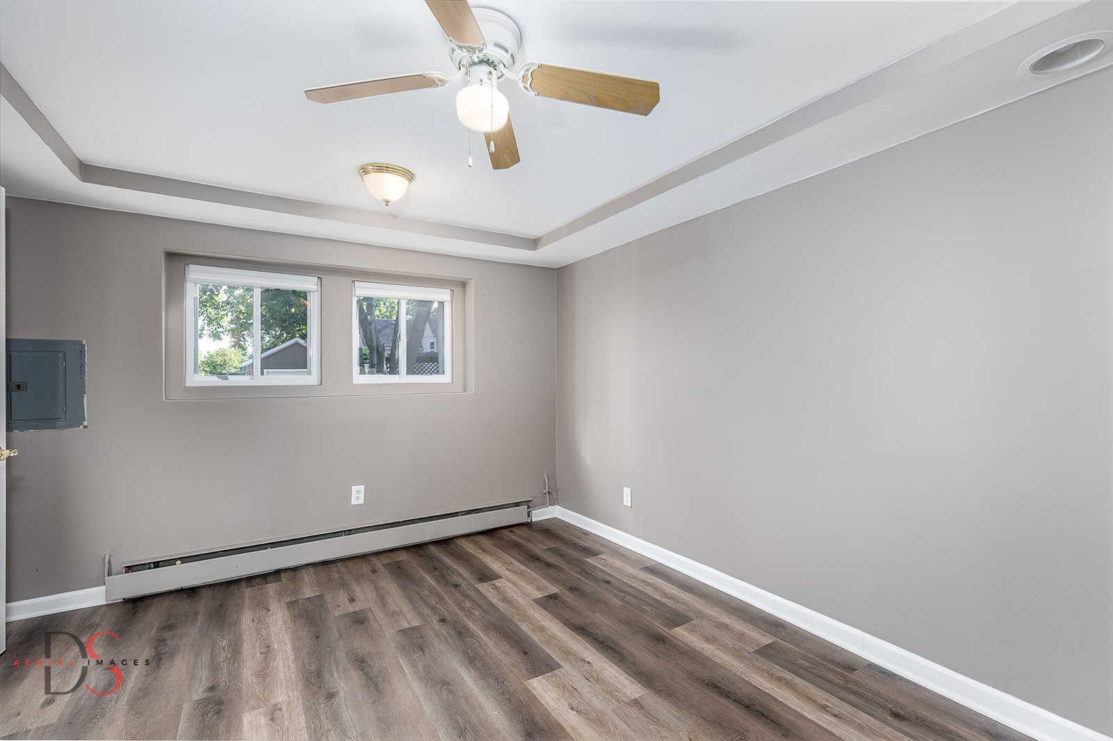401 Scott Street Marseilles, IL 61341 - Photo 17 of 28 an empty room with a window and ceiling fan