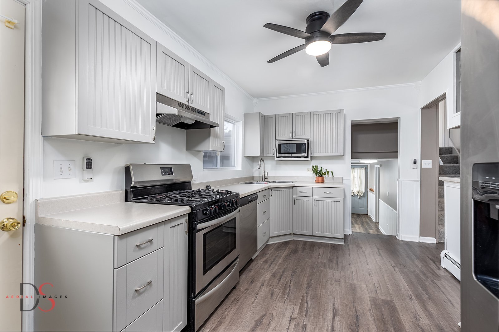 401 Scott Street Marseilles, IL 61341 - Photo 5 of 28 a kitchen with a stove a sink and a refrigerator