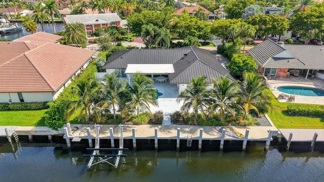 a room with table chairs and entryway