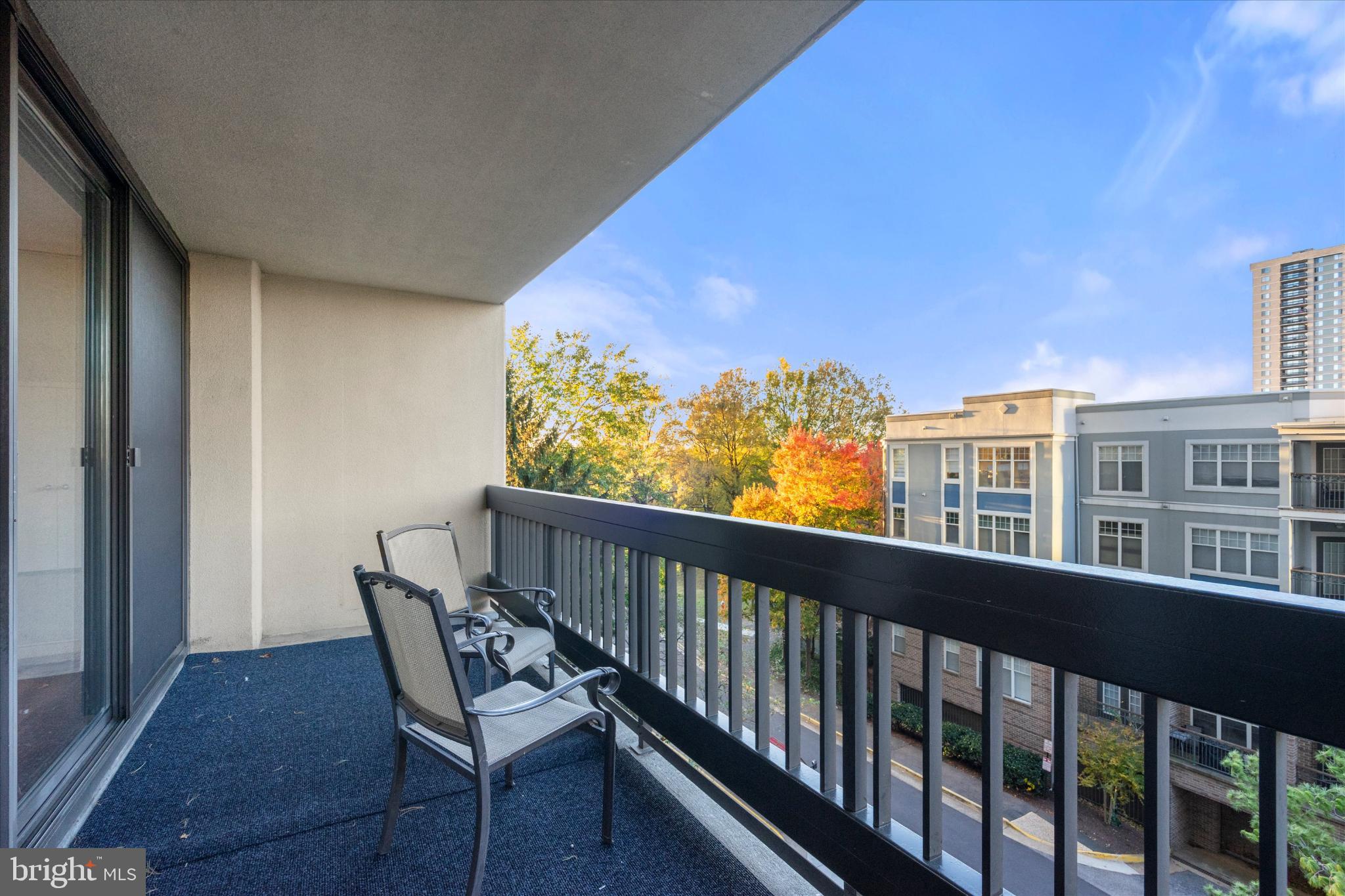 5505 Seminary Road, Unit 408N Falls Church, VA 22041 - Photo 17 of 31 a view of a city from a balcony with furniture