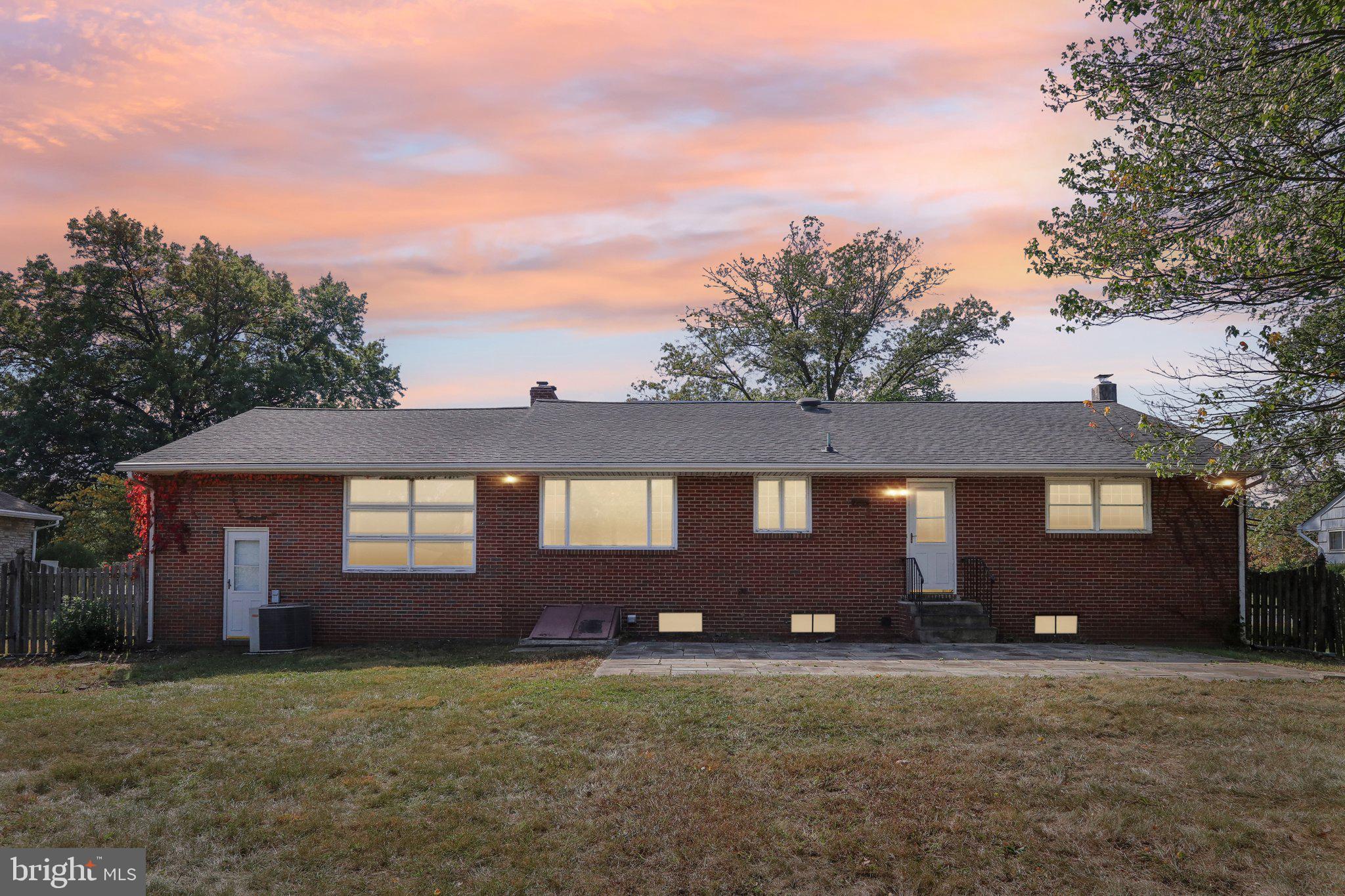 2236 Pennington Road Trenton, NJ 08638 - Photo 41 of 45 Twilight photo of back of 2236 Pennington