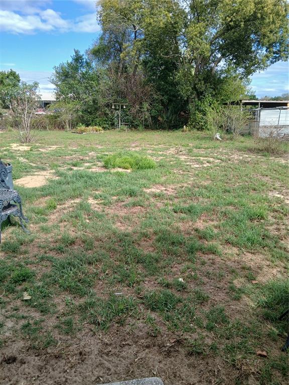 171 Melhorn Road Haines City, FL 33844 - Photo 11 of 13 a view of a yard with a house