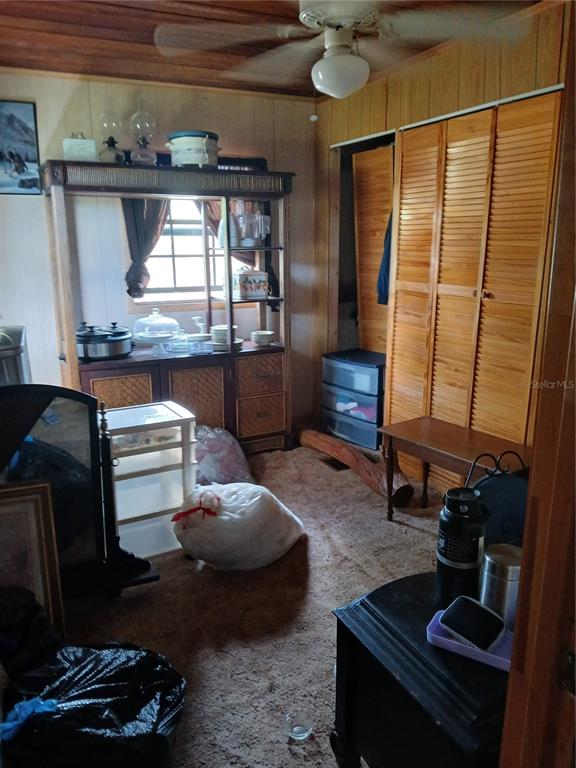 171 Melhorn Road Haines City, FL 33844 - Photo 8 of 13 a living room with a couch and a table