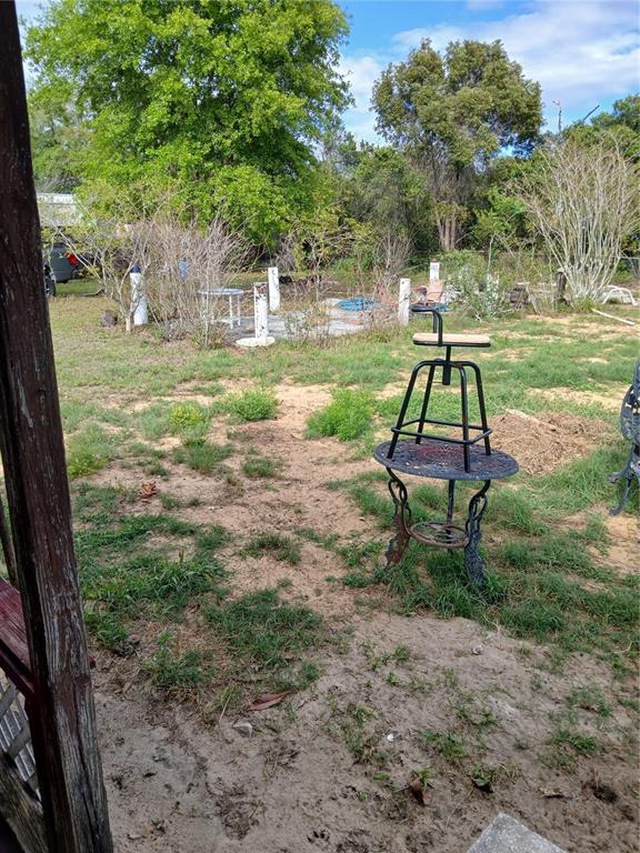 171 Melhorn Road Haines City, FL 33844 - Photo 10 of 13 a view of a park with a bench