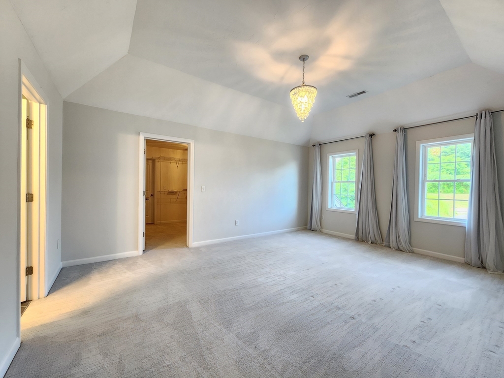 16 Exeter Road Hudson, MA 01749 - Photo 19 of 42 an empty room with windows and closet
