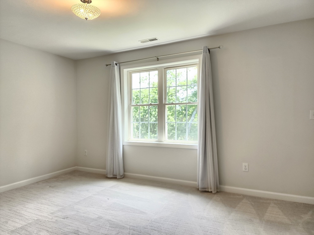 16 Exeter Road Hudson, MA 01749 - Photo 24 of 42 an empty room with windows