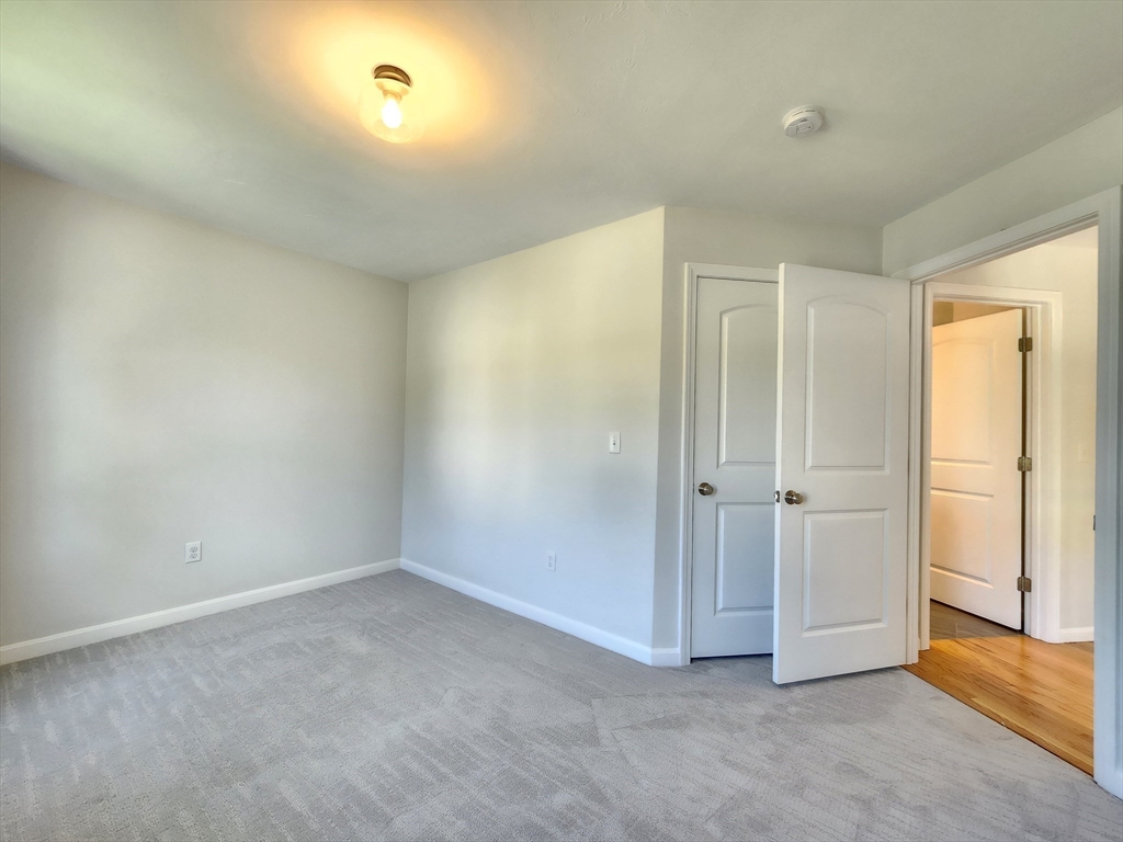 16 Exeter Road Hudson, MA 01749 - Photo 30 of 42 a view of an empty room and closet area