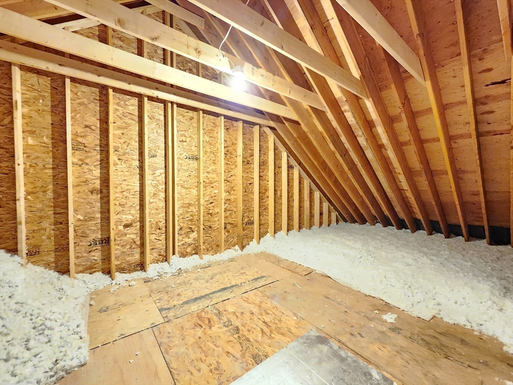 16 Exeter Road Hudson, MA 01749 - Photo 31 of 42 a bedroom with a bed and a window