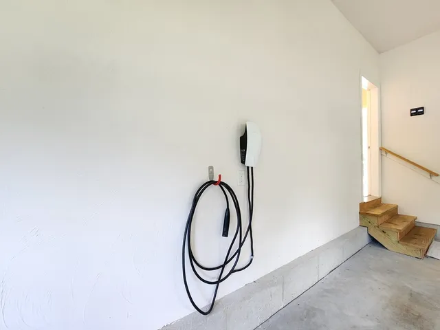 a view of balcony with wooden floor and seating space