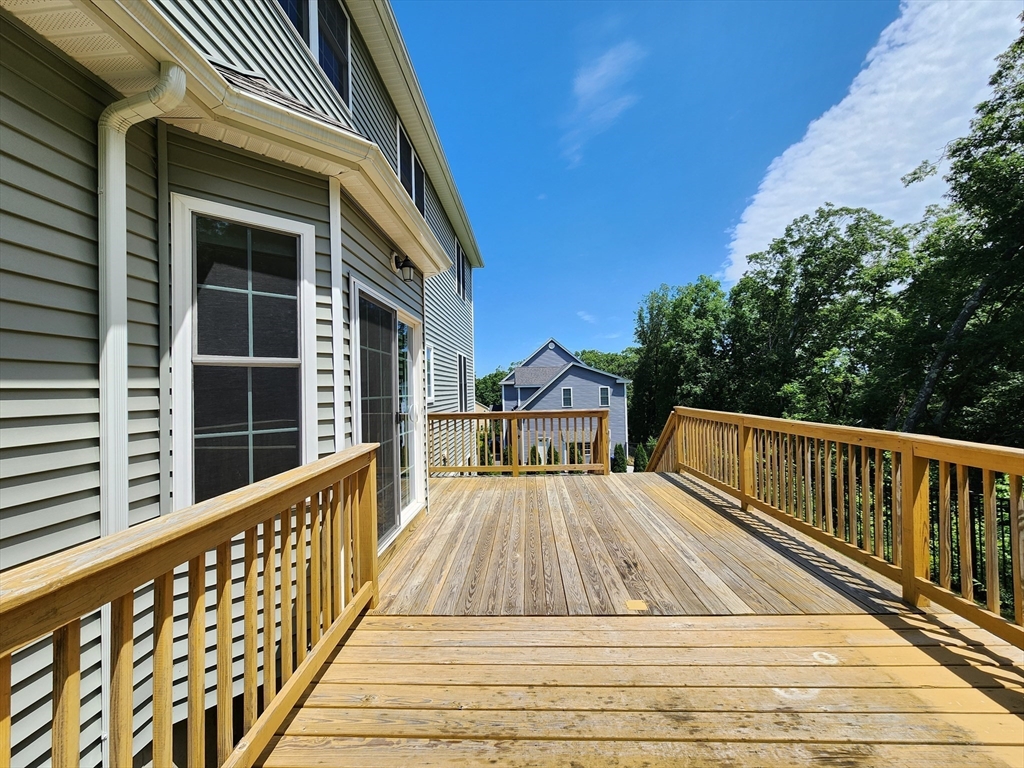 16 Exeter Road Hudson, MA 01749 - Photo 39 of 42 a view of balcony with wooden floor and seating space