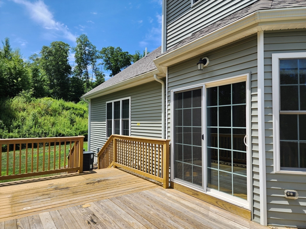 16 Exeter Road Hudson, MA 01749 - Photo 40 of 42 a view of a house with a large window