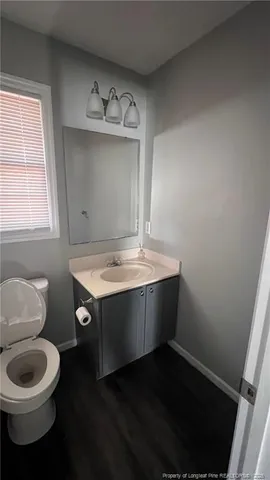 a bathroom with a sink and a toilet