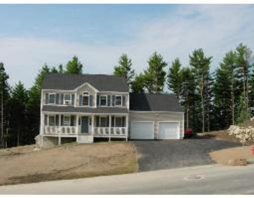 Lot 1 Carruth Road Templeton, MA 01468 - Photo 1 of 1 a front view of a house with a garden and trees
