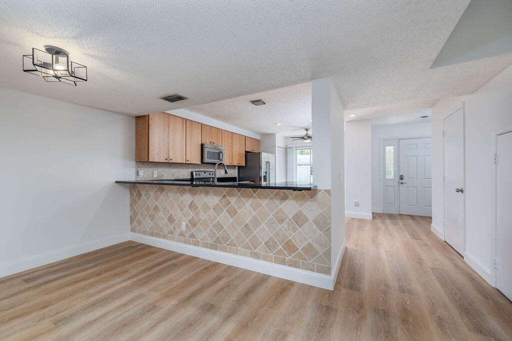 6159 Riverwalk Lane, Unit 2 Jupiter, FL 33458 - Photo 12 of 40 428A0135-Edit