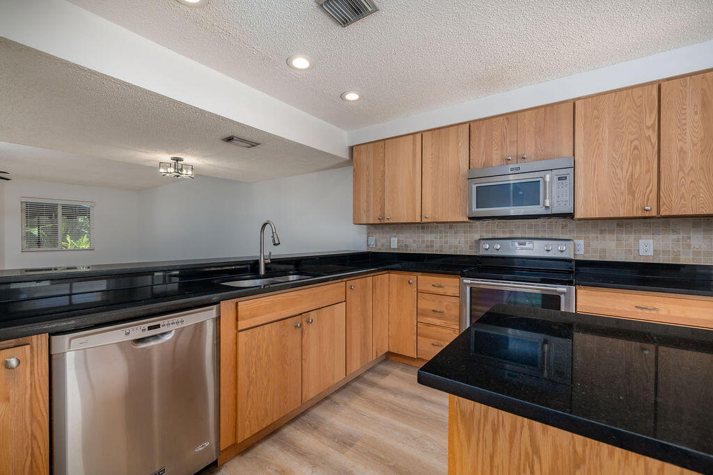 6159 Riverwalk Lane, Unit 2 Jupiter, FL 33458 - Photo 7 of 40 428A0089-Edit