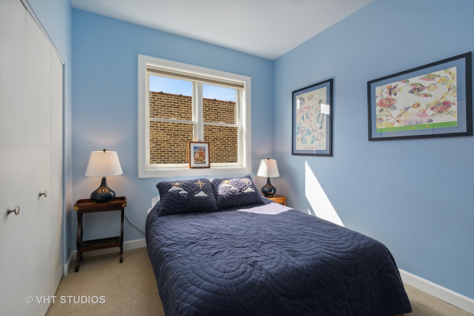 1725 North Mohawk Street, Unit 2S Chicago, IL 60614 - Photo 11 of 15 a bedroom with a bed and a window
