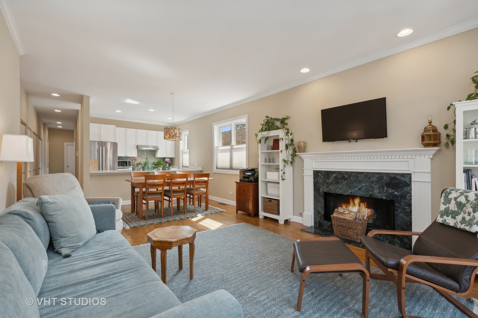 1725 North Mohawk Street, Unit 2S Chicago, IL 60614 - Photo 3 of 15 a living room with furniture and a fireplace