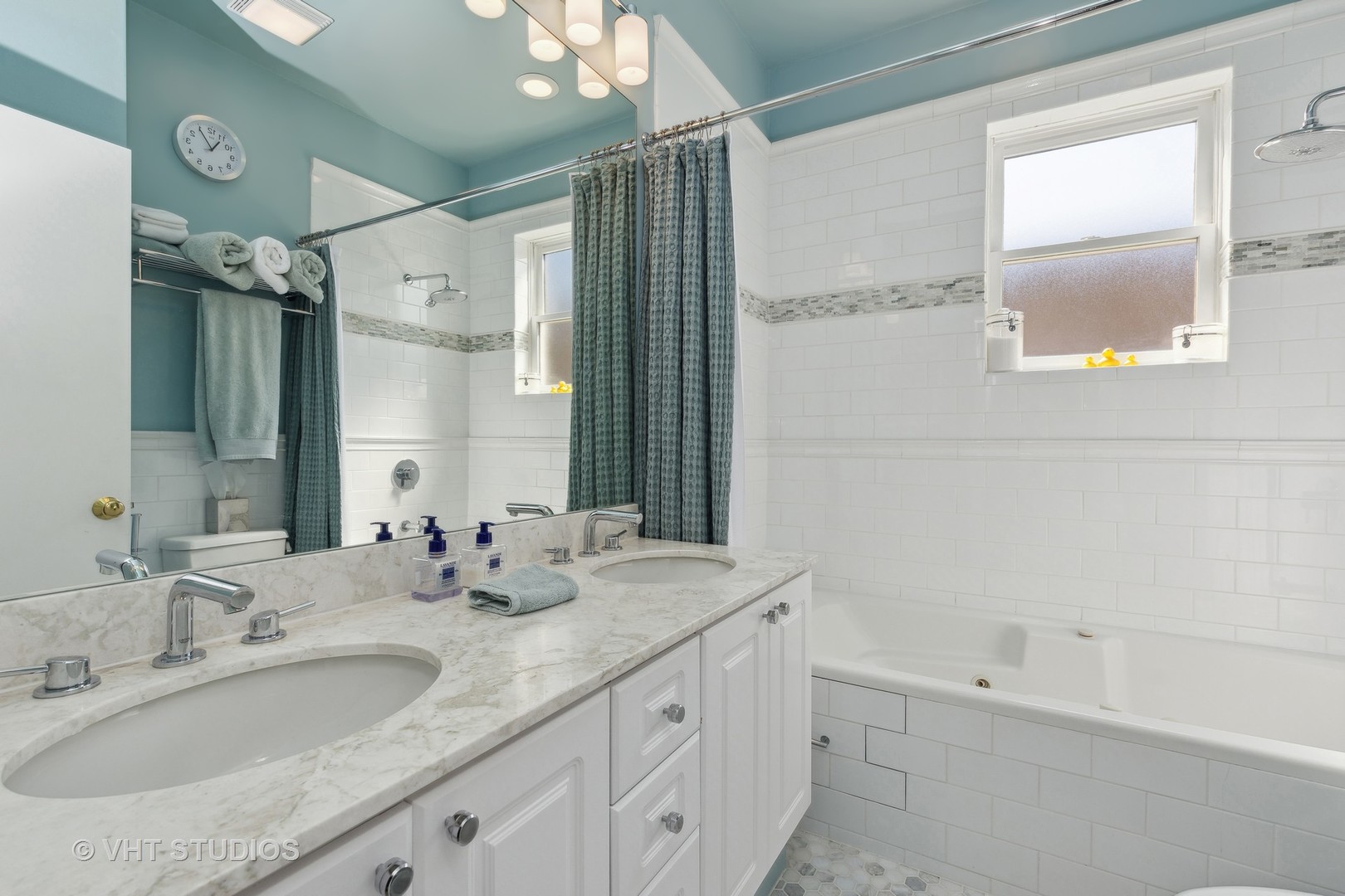 1725 North Mohawk Street, Unit 2S Chicago, IL 60614 - Photo 9 of 15 a bathroom with a granite countertop sink mirror and double