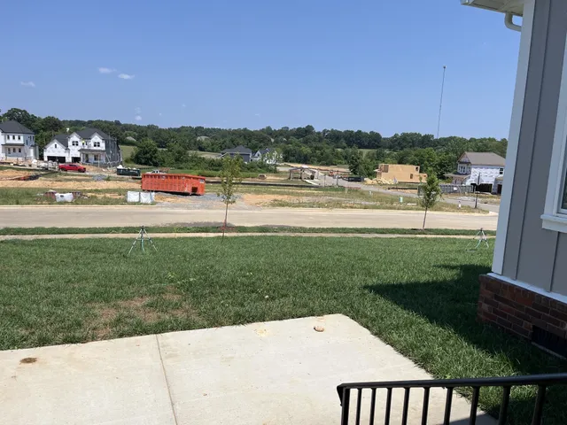 a view of a house with a big yard