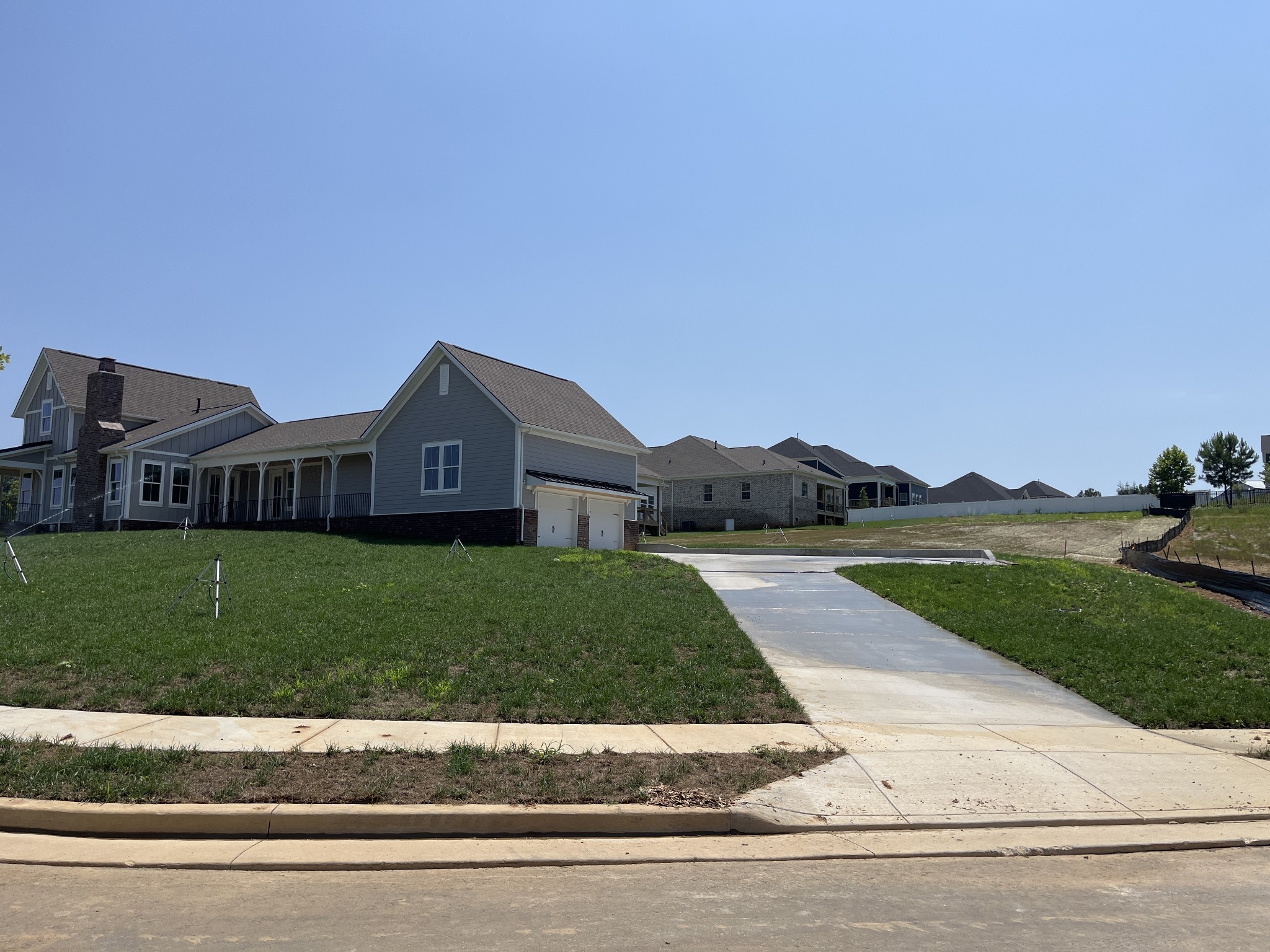 7509 Shoal Mill Point Fairview, TN 37062 - Photo 20 of 29 a house view with a garden space