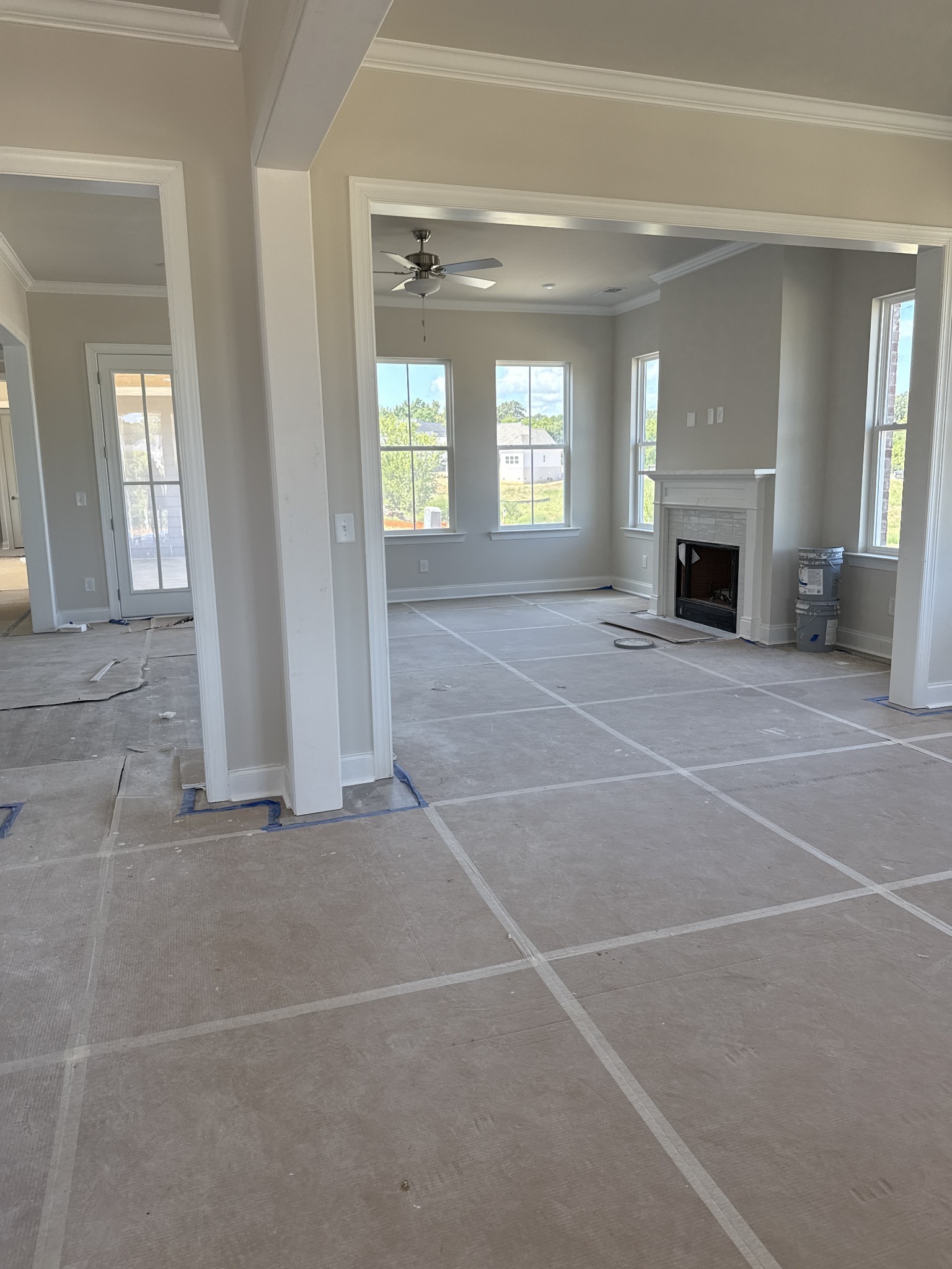 7509 Shoal Mill Point Fairview, TN 37062 - Photo 21 of 29 an empty room with windows and fireplace