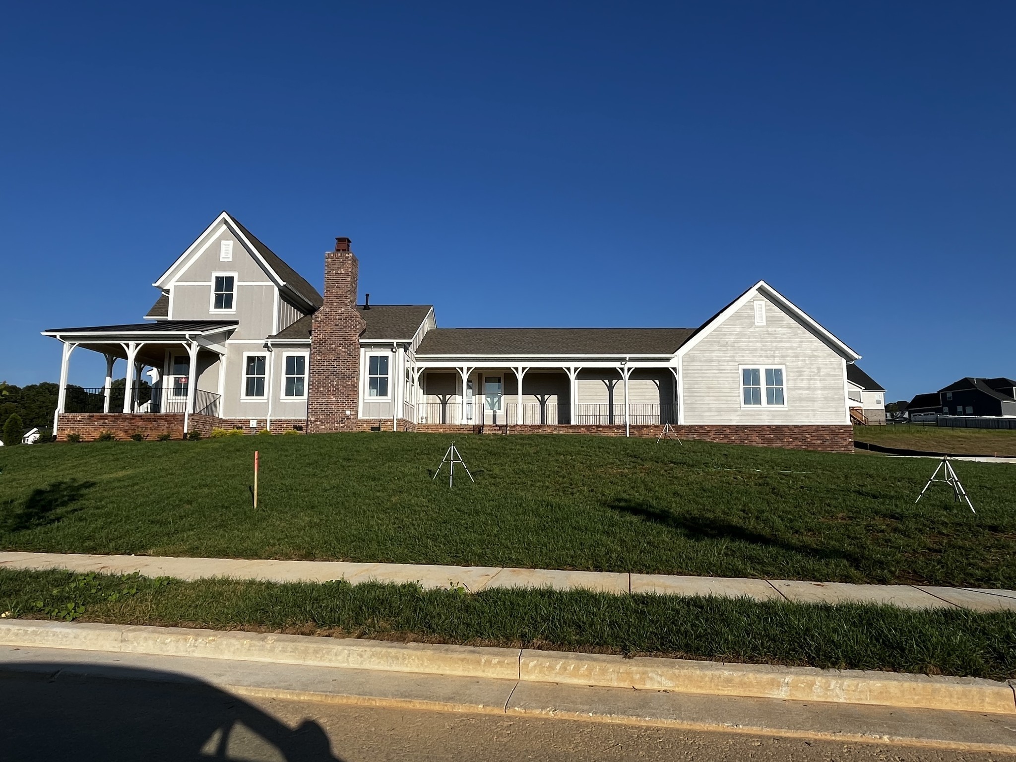 7509 Shoal Mill Point Fairview, TN 37062 - Photo 3 of 29 a front view of a house with a yard and garage