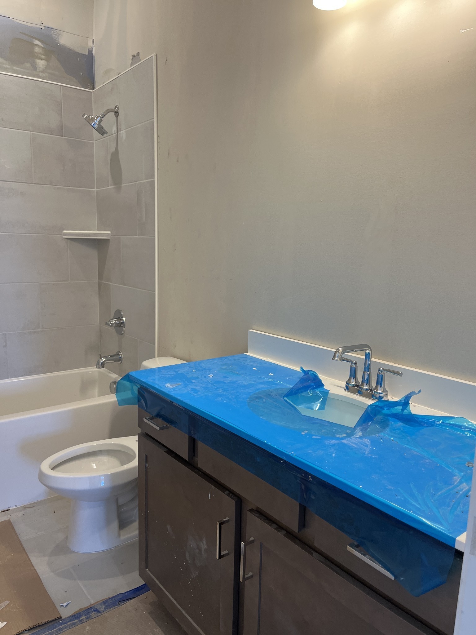 7509 Shoal Mill Point Fairview, TN 37062 - Photo 7 of 29 a bathroom with a sink a toilet and shower