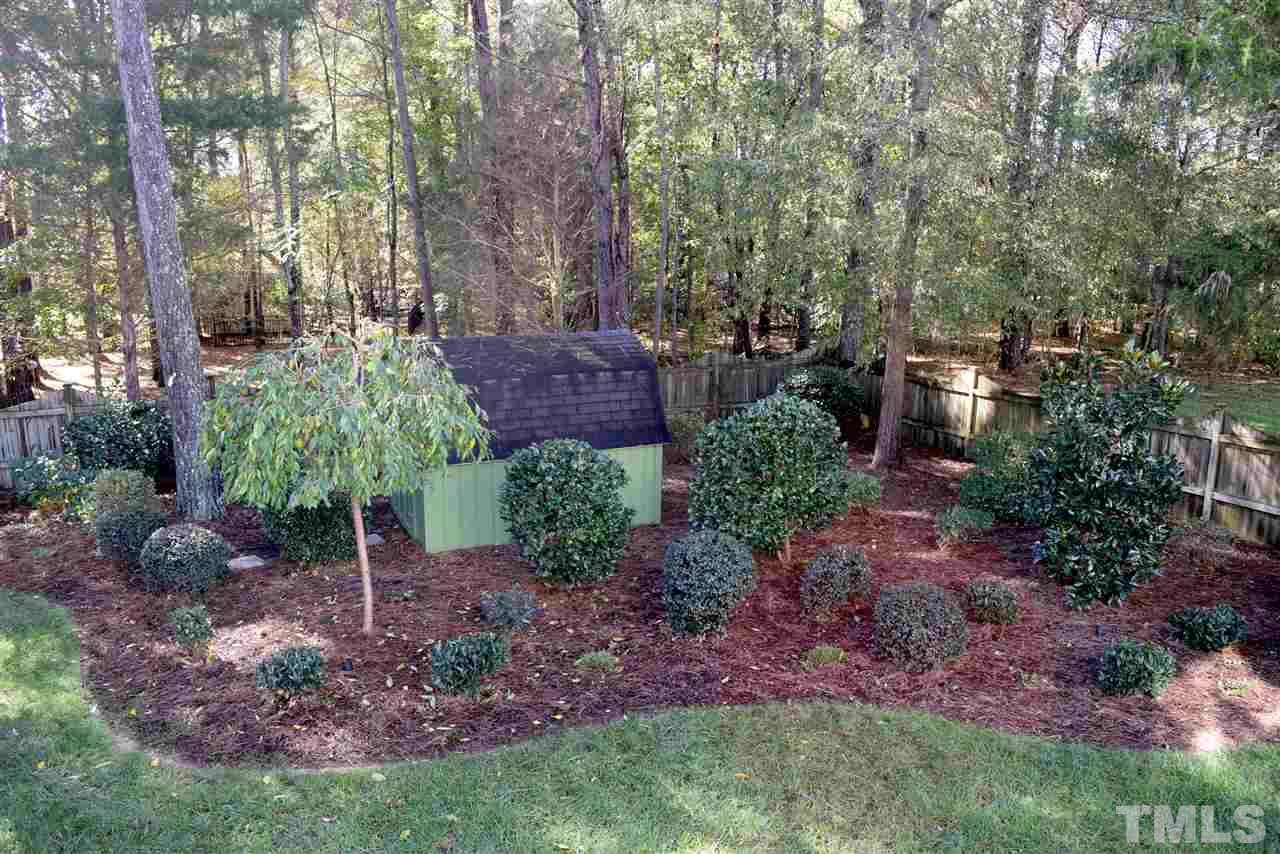 Another part of the back yard which shows the large storage shed.