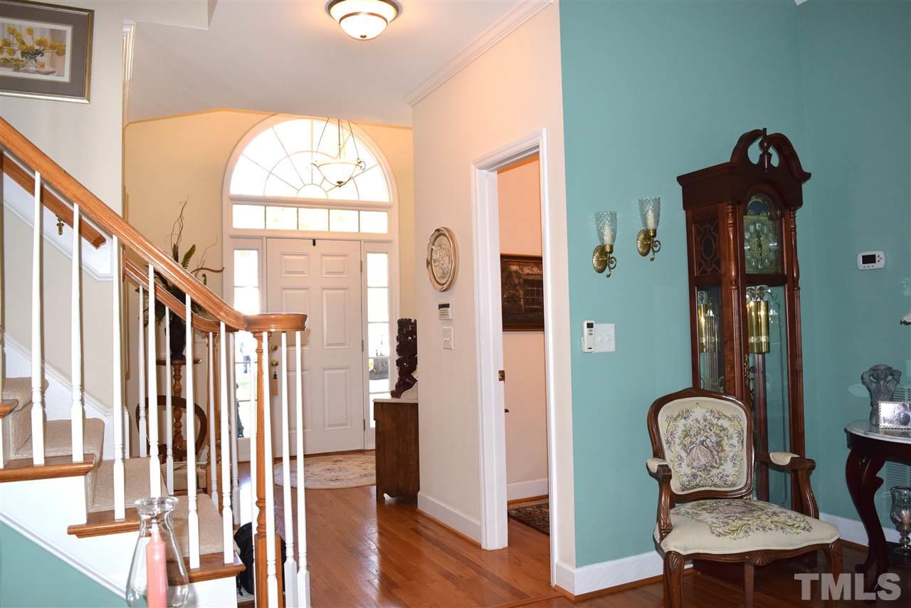 Foyer as seen from the living room... stairs to secondary bedrooms