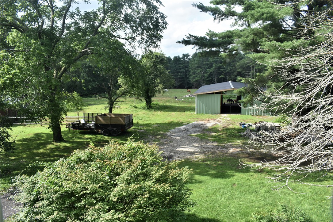 397 Chestnut Hill Road Glocester, RI 02814 - Photo 24 of 33 property to side and back of house