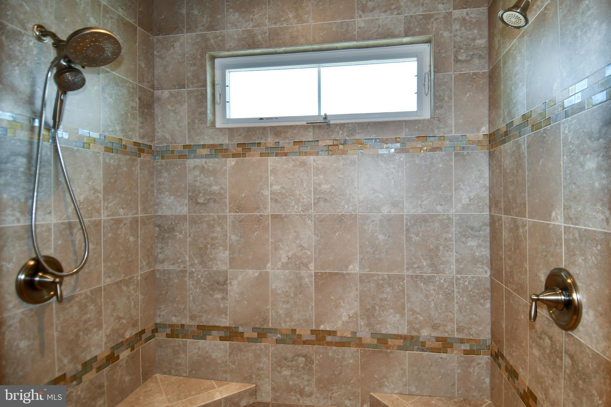 409 Hydrangea Place Gaithersburg, MD 20878 - Photo 26 of 49 a bathroom with a shower