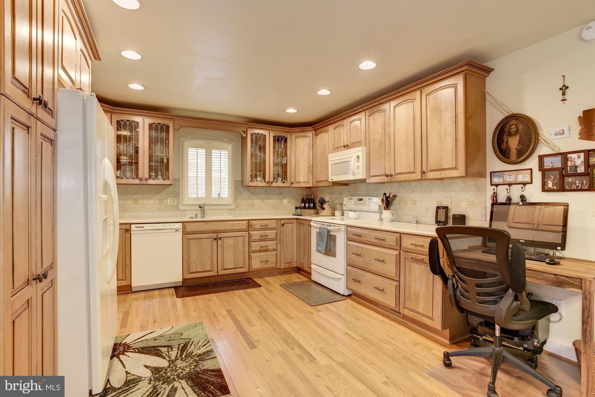 306 Homewood Road Linthicum, MD 21090 - Photo 11 of 32 a kitchen with a sink appliances cabinets and furniture