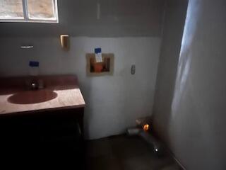 3224 Baylor Street Lubbock, TX 79415 - Photo 15 of 23 a bathroom with a sink and a mirror