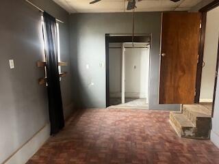 3224 Baylor Street Lubbock, TX 79415 - Photo 18 of 23 a view of an empty room with bathroom and a mirror