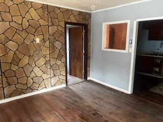 3224 Baylor Street Lubbock, TX 79415 - Photo 4 of 23 a view of a wooden door