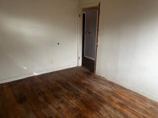 3224 Baylor Street Lubbock, TX 79415 - Photo 5 of 23 an empty room with wooden floor