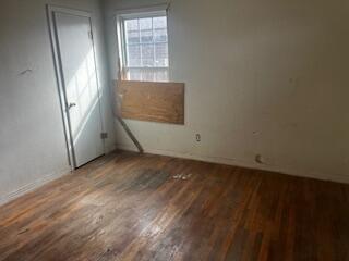 3224 Baylor Street Lubbock, TX 79415 - Photo 6 of 23 an empty room with windows