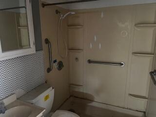 3224 Baylor Street Lubbock, TX 79415 - Photo 9 of 23 a bathroom with a bathtub