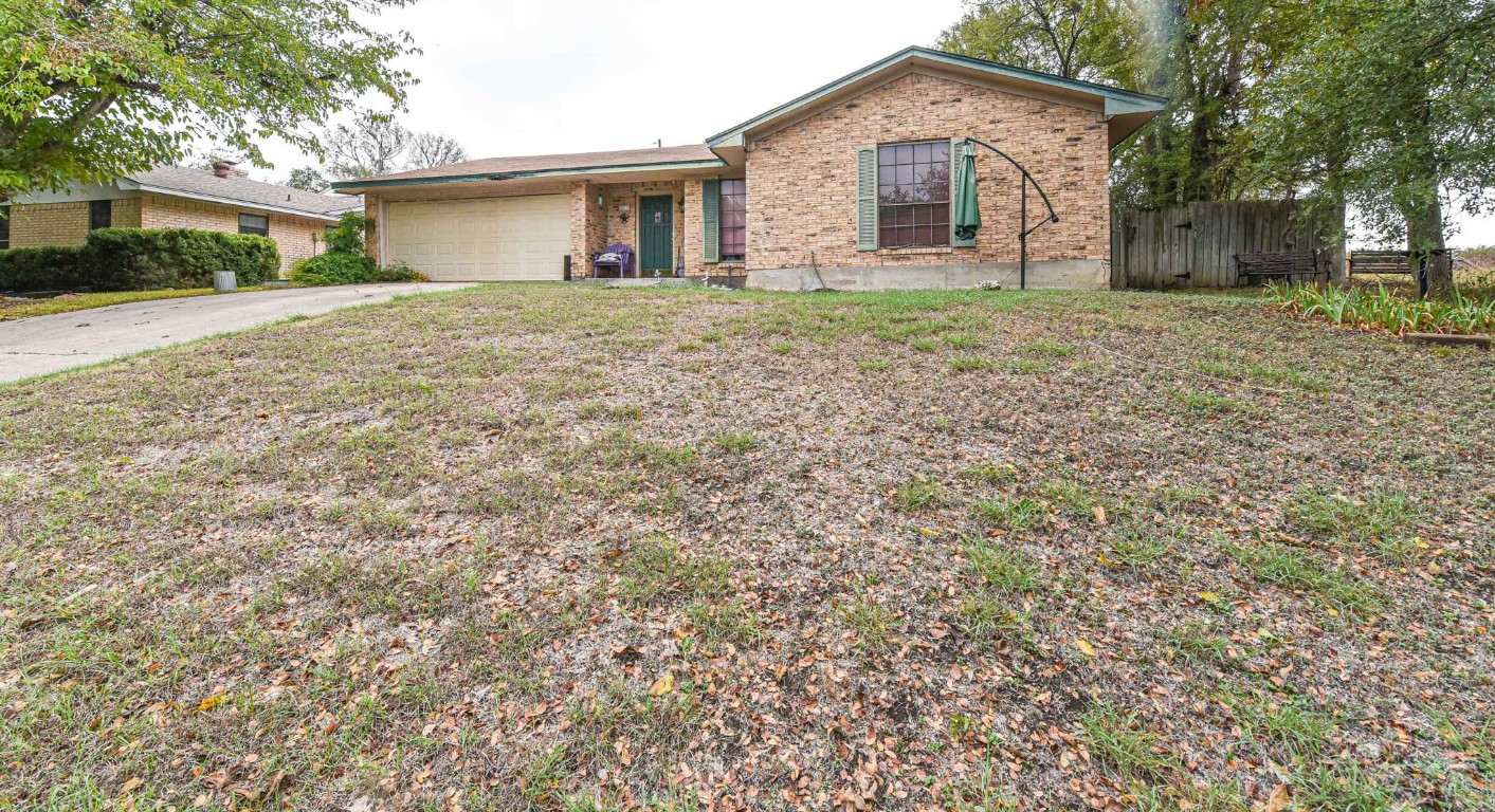 4013 Valley View Drive Temple, TX 76502 - Photo 1 of 1 a front view of a house with a yard and trees