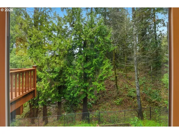 a view of a balcony with an outdoor space