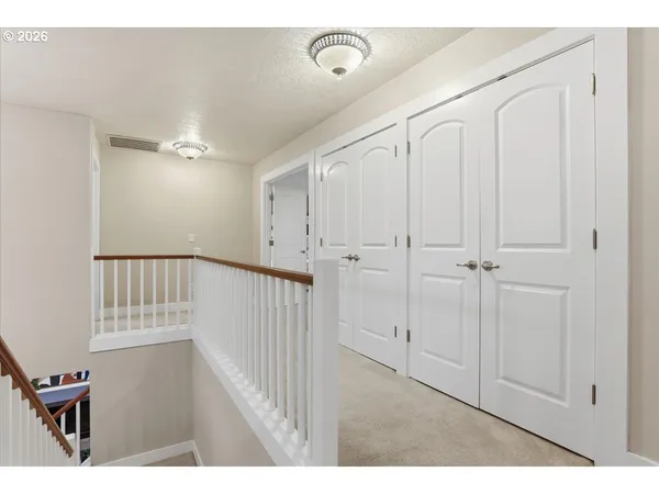 a view of a hallway with entryway