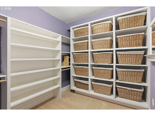 a view of a livingroom with empty shelves