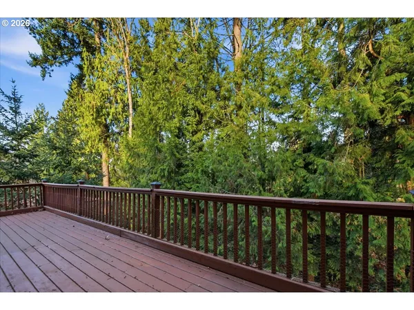 a view of balcony with wooden floor