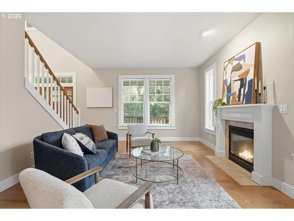 a living room with furniture or couch and a fireplace
