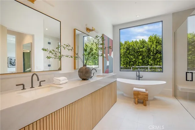 a living room with furniture gym equipment and a wooden floor