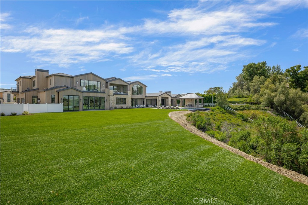 24105 Hidden Ridge Road Hidden Hills, CA 91302 - Photo 44 of 52 a view of a house with a big yard