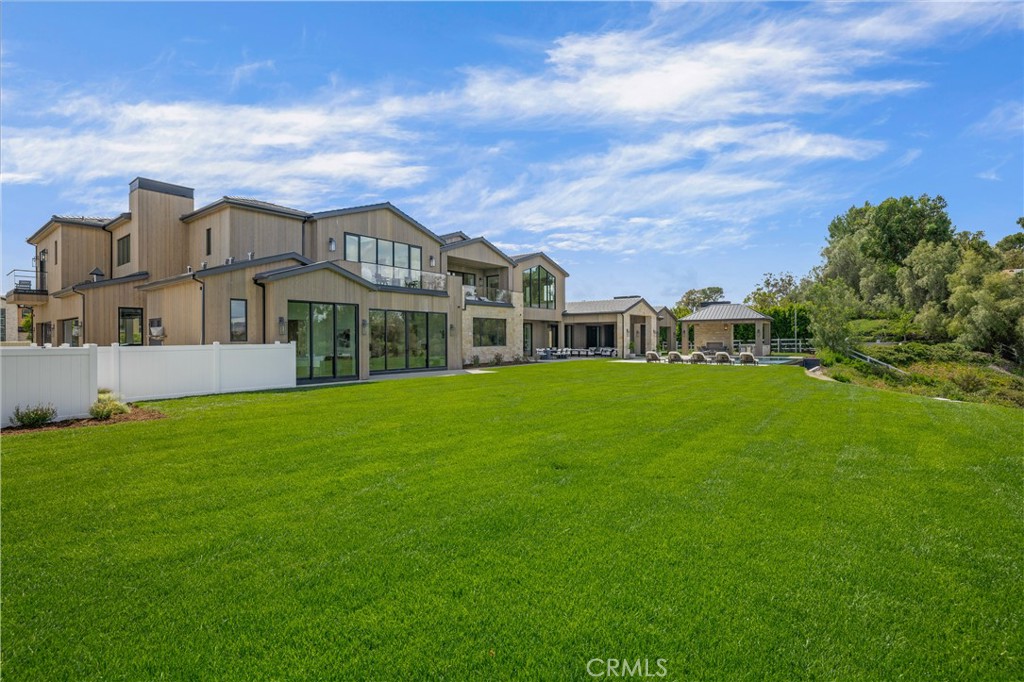 24105 Hidden Ridge Road Hidden Hills, CA 91302 - Photo 45 of 52 a view of a house with a big yard